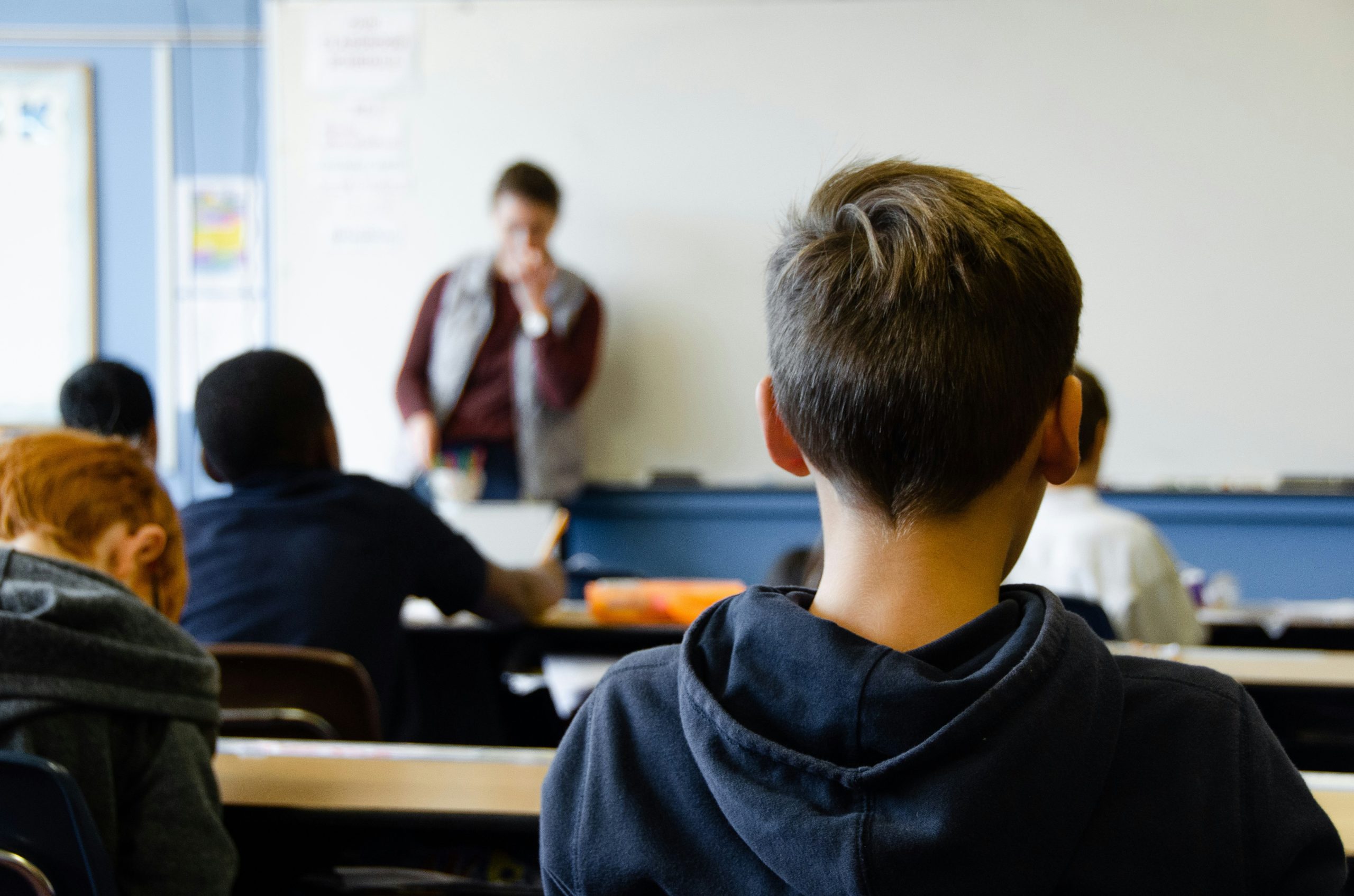 A class of students working at their desks, each engaging with the same lesson differently