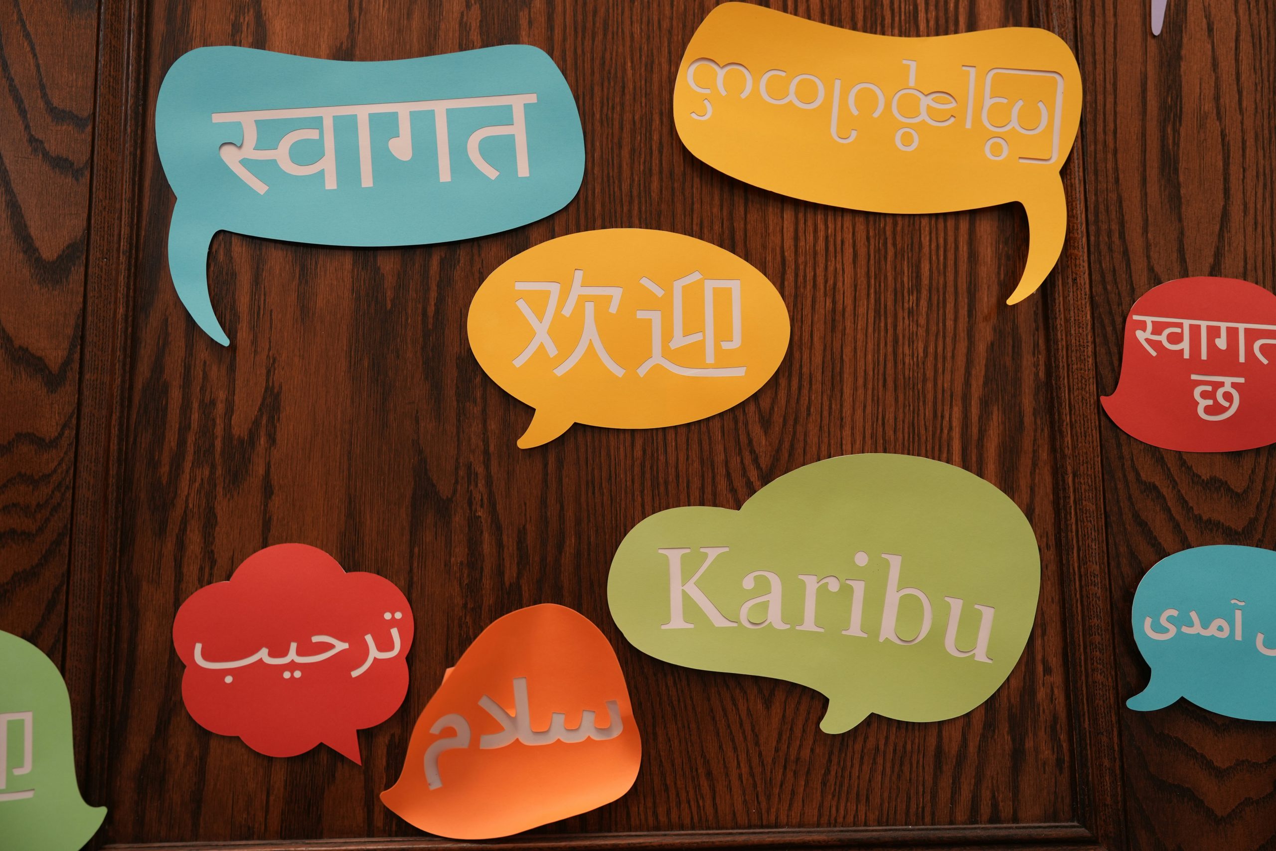 Colorful speech bubbles on a wall, representing multiple languages in communication
