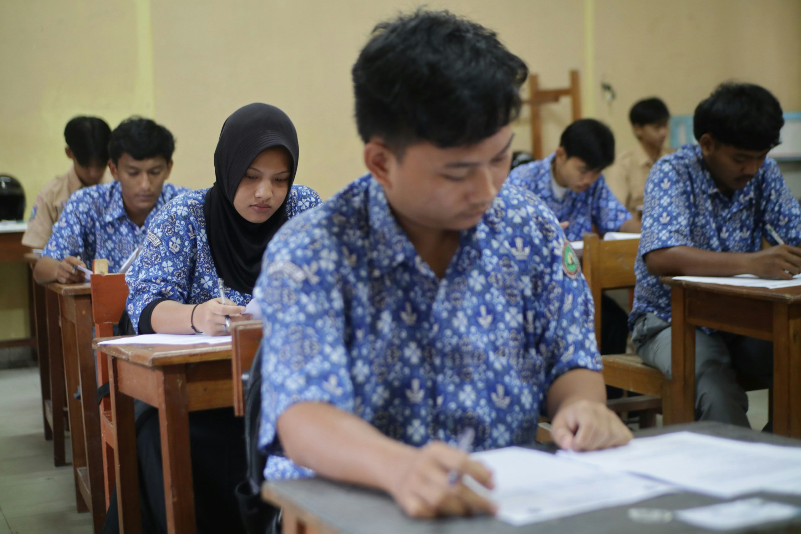 Students taking a test in a classroom